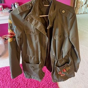 green jacket w flowers